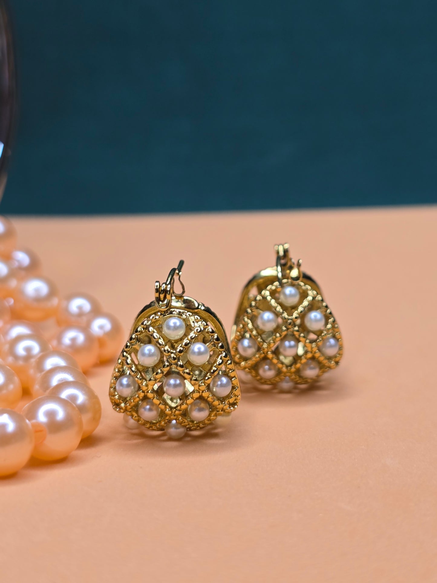 Golden Glow: Pearl-Crowned Stainless Steel Earrings