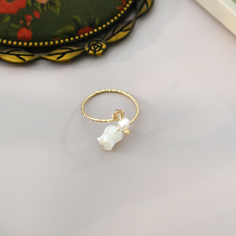 Delicate Natural Freshwater Pearl Shell Flower Ring with high quality Gold Plating and an adjustable Open Design