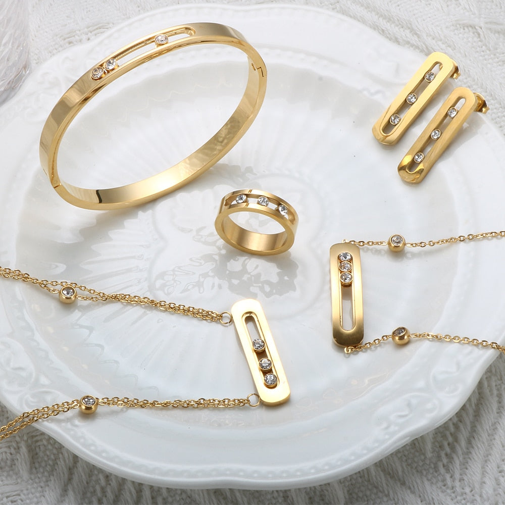 Stainless steel ring Jewelry set: bracelet, necklace, earrings and sliding bracelet with zircon stones