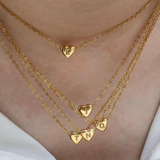 Mini Love Heart Necklace with Initial made of high quality Stainless Steel and gold plating