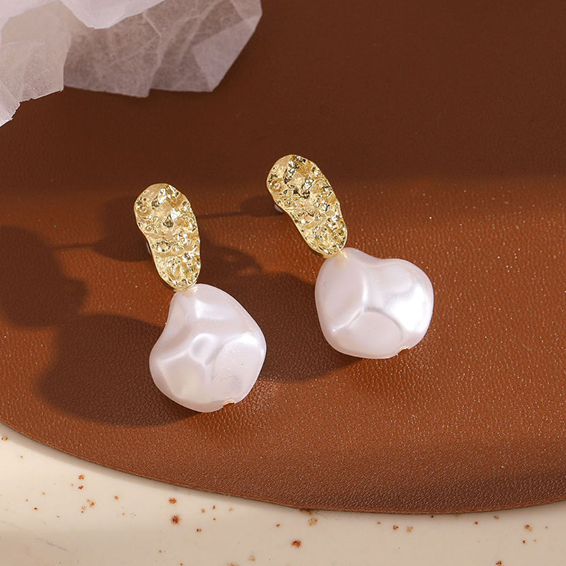 New Trendy Earrings made of high quality Gold Plated and Imitation Baroque Pearls.