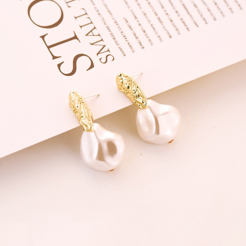 New Trendy Earrings made of high quality Gold Plated and Imitation Baroque Pearls.