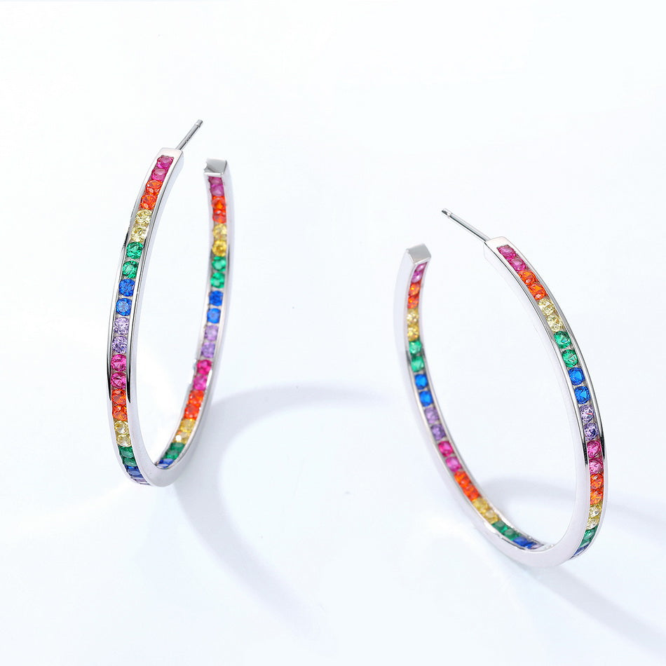 Earrings made of 925 Silver and gold-plated with multicolored cubic zirconias.