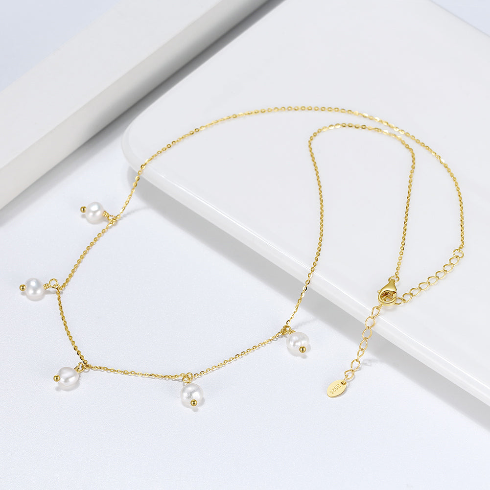 Necklace made in Sterling Silver and bathed in high quality gold, with Baroque Pearls