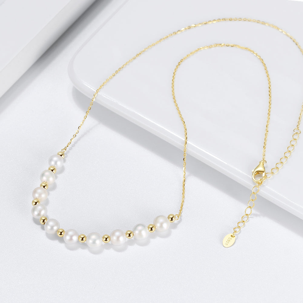 Necklace made in Sterling Silver and bathed in high quality gold, with Baroque Pearls