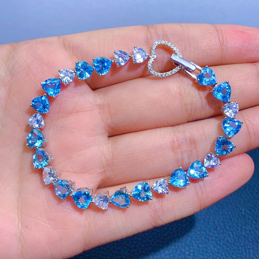 Pulsera hecha de Plata Esterlina 925 con Cristales colo Topacio Azul Suizo en forma de corazón