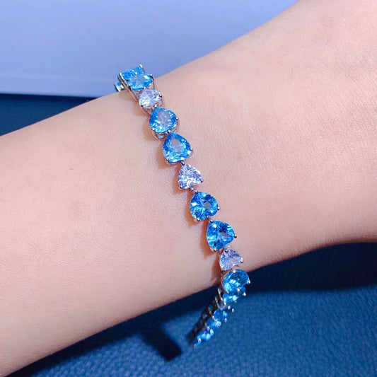 Pulsera hecha de Plata Esterlina 925 con Cristales colo Topacio Azul Suizo en forma de corazón