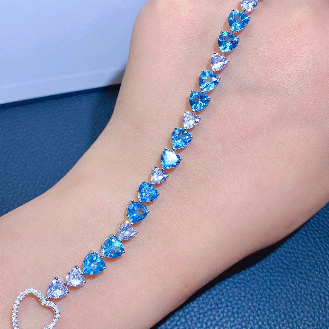 Pulsera hecha de Plata Esterlina 925 con Cristales colo Topacio Azul Suizo en forma de corazón