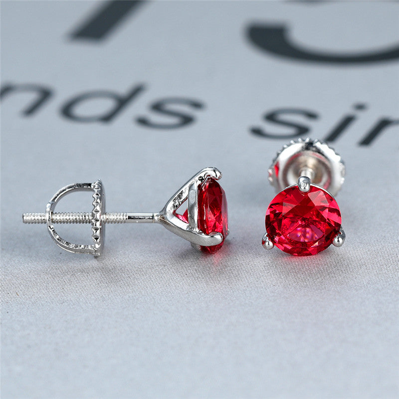 Round 3-claw earrings with red crystal zircons and screw closure